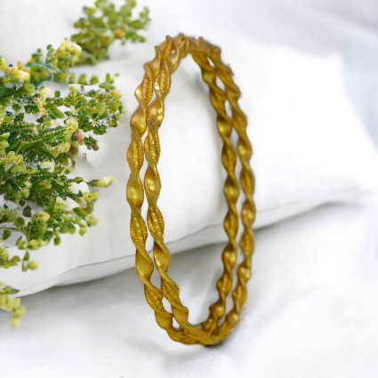 Stylish Gold Plated Twisted Bangles For Girls
